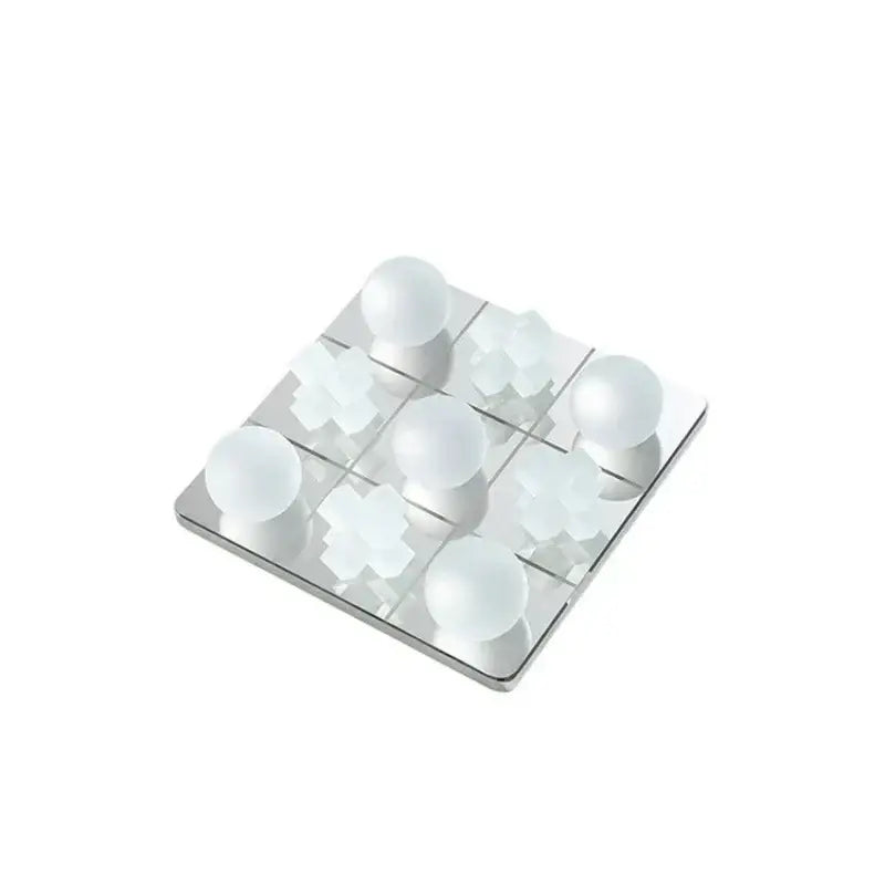 Modern frosted glass geometric tic tac toe set with silver board and frosted white spherical and cross pieces decorbites frosted glass