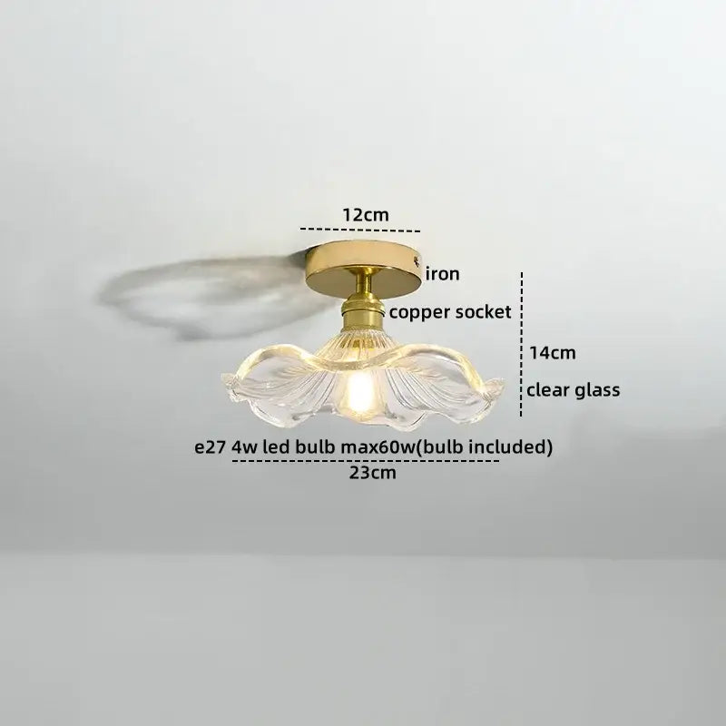 Modern frosted glass led ceiling light with a delicate clear glass pendant and brass-toned iron mounting hardware