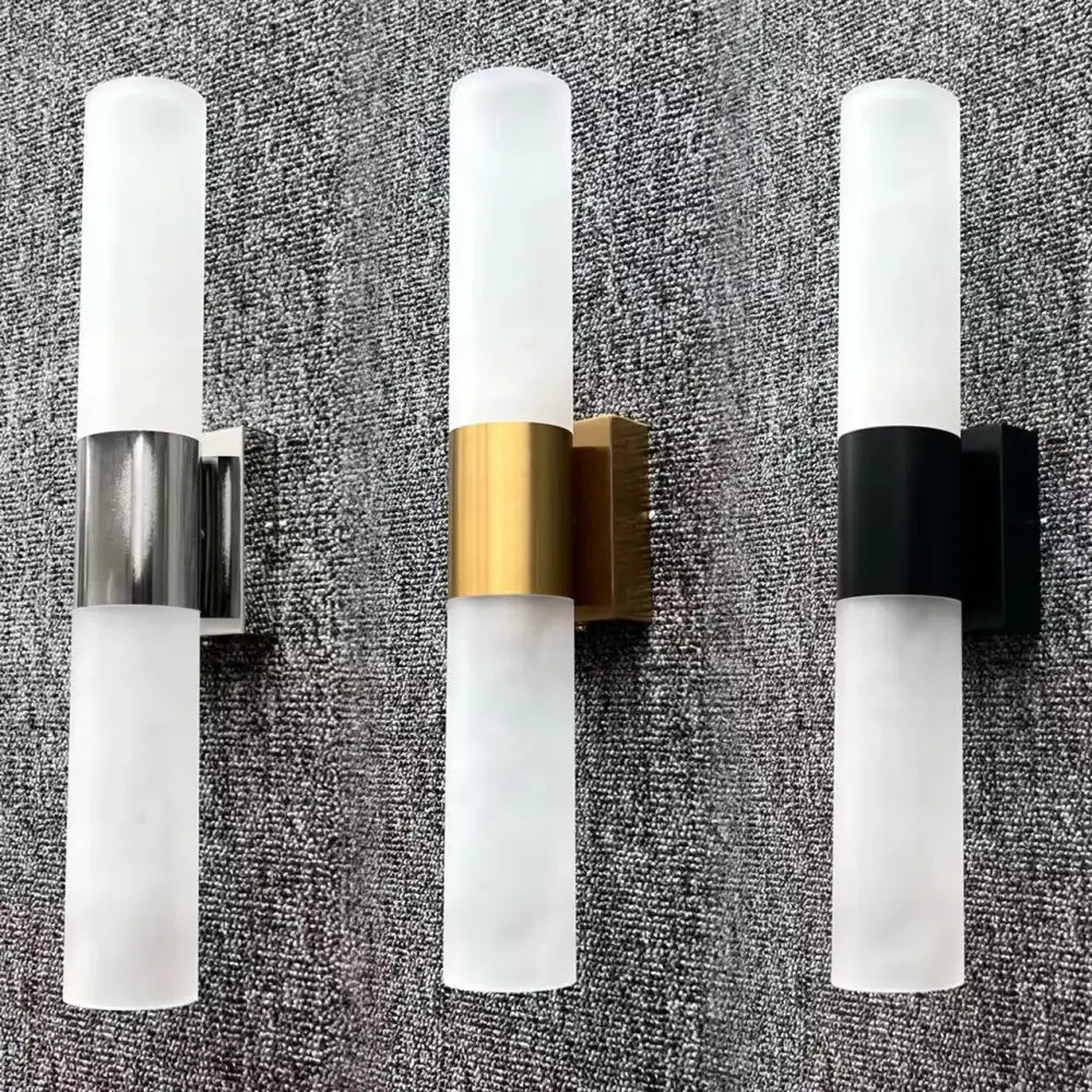 Three modern frosted glass led wall lamps with silver gold and black metallic bands for bedroom sconces