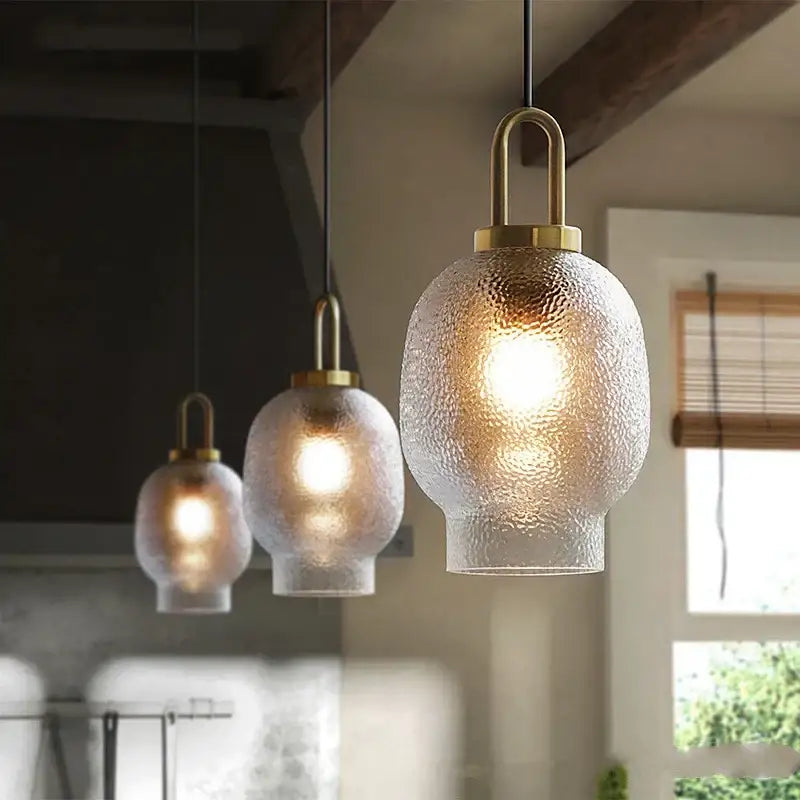 Modern frosted glass pendant light with textured glass shade and brass metal fixture for kitchen lighting pendant lights