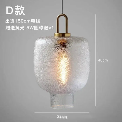 Modern frosted glass pendant lights with textured glass and brass finish featuring 5w warm white led bulb
