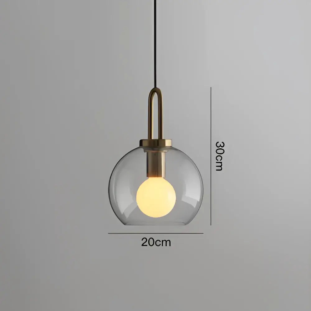 Modern frosted gray glass ball pendant light with clear glass globe brass-toned fixture and black cord for dining decorbites glass ball pendant