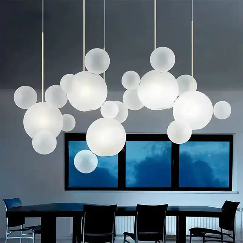 Modern frosted white bubble ball pendant light with varying sizes on thin metallic rods for kitchen island decorbites bubble ball pendant