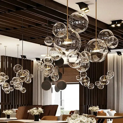 Clear glass bubble ball pendant light with gold-toned fixtures modern decorbites bubble ball for kitchen island