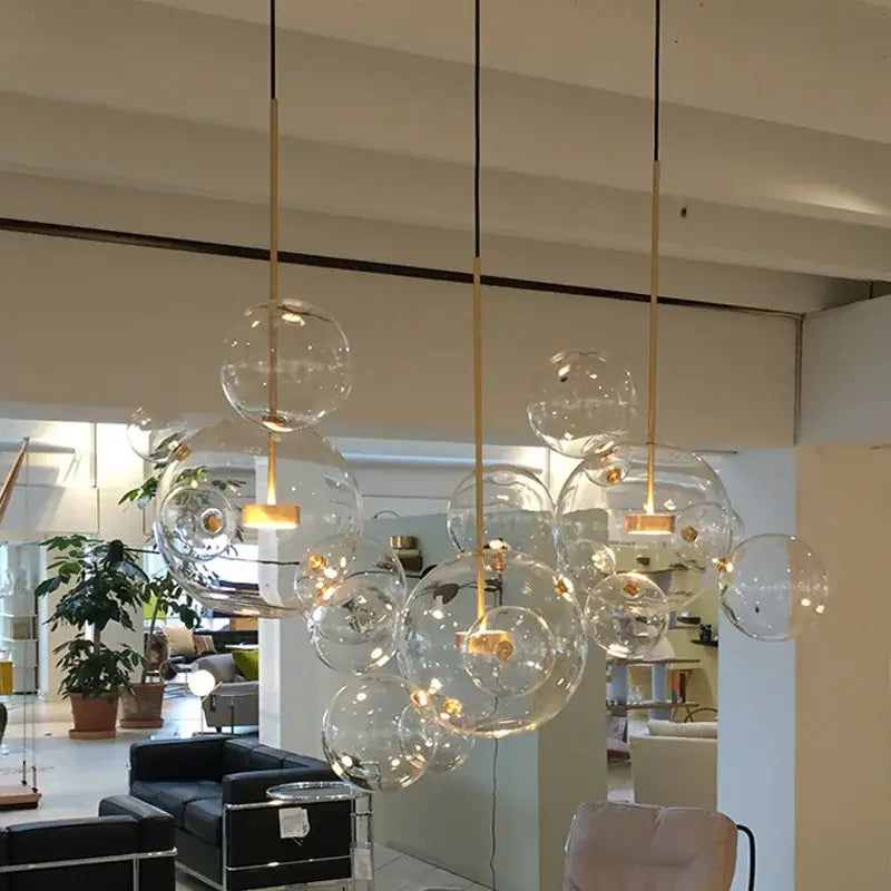 Modern frosted white bubble ball pendant light with clear glass bubble shades and gold-toned metal fixtures for kitchen island decorbites bubble ball pendant