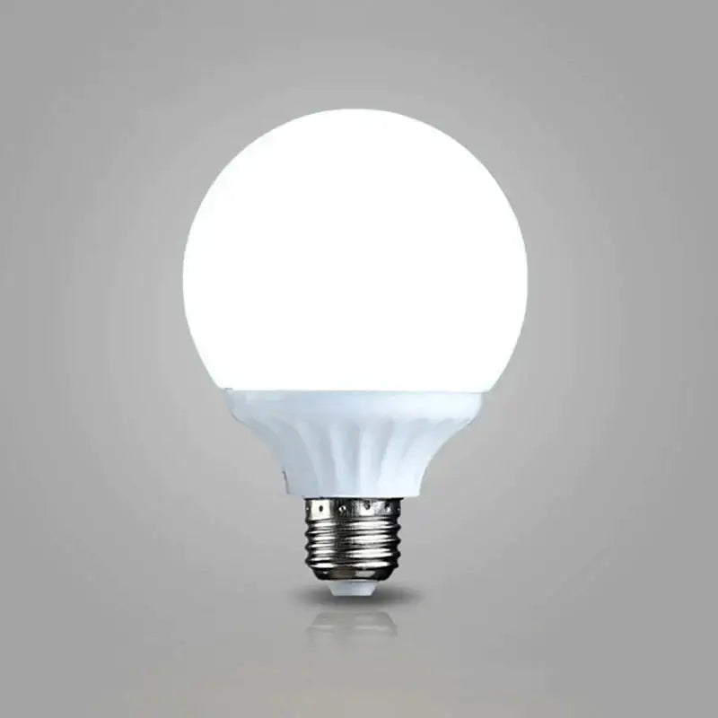 Modern frosted white e27 9w led bulb with high brightness round globe and metallic screw base for bedroom use