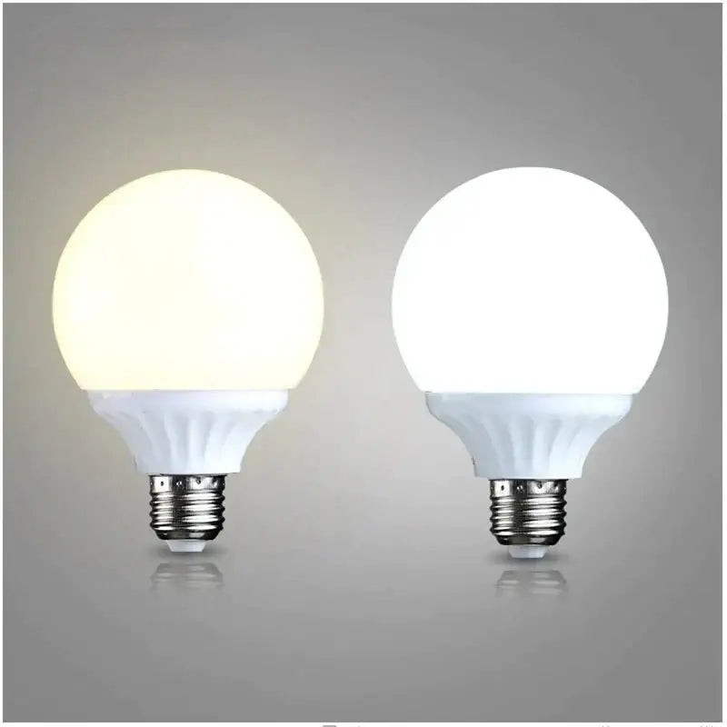 Two white frosted glass e27 9w led bulbs with metallic screw bases for high brightness round bedroom lighting