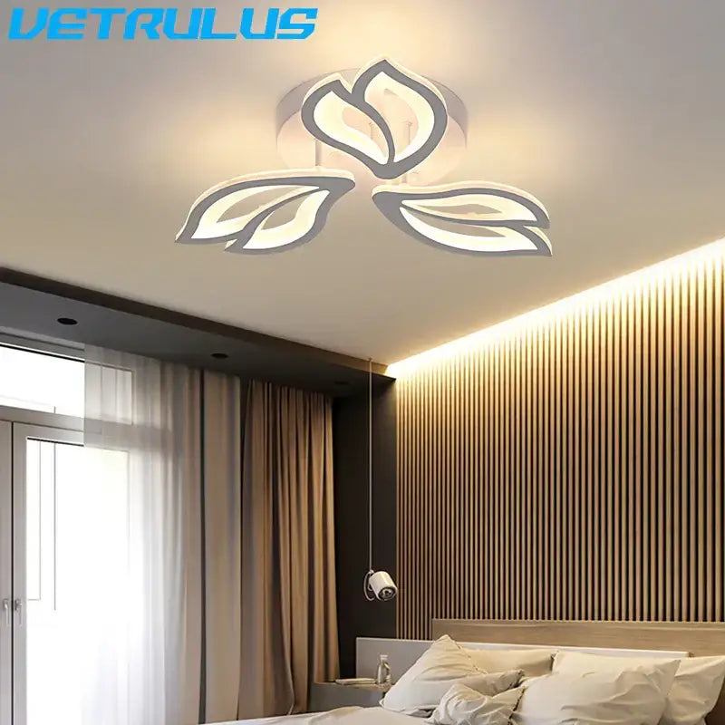Modern geometric acrylic led ceiling light with white and gray floral design emitting soft ambient lighting for living room