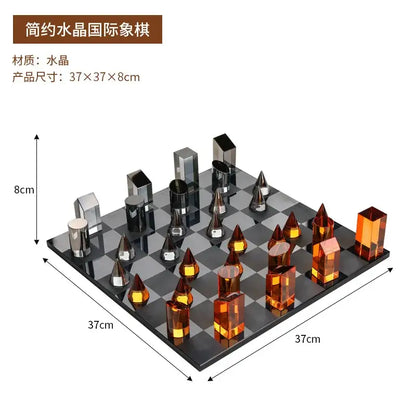 A sleek geometric design chess set with translucent amber and silver crystal pieces for modern home decor
