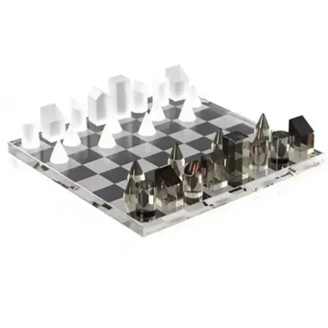 Modern acrylic chess set with translucent white and metallic silver pieces on black-and-white board for home decor
