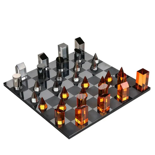 Modern geometric amber and silver chess set with translucent pieces on a glossy board for stylish home decor