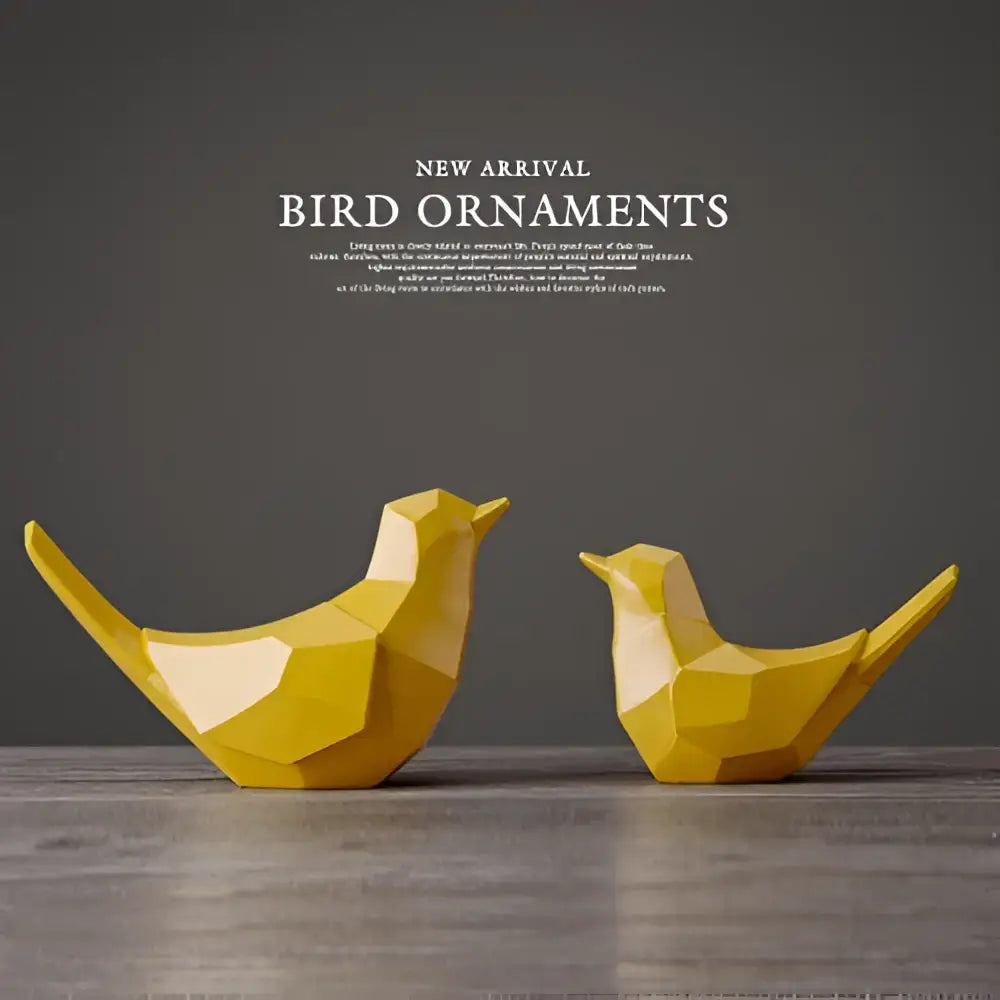 Two matte yellow geometric couple birds resin figurines with angular faceted designs for modern decorbites decor