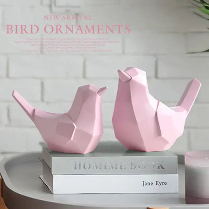 Two matte pink geometric birds resin figurines with angular faceted designs modern decorbites couple birds decor