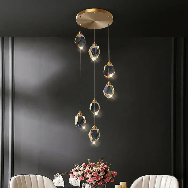 Modern geometric black and gold crystal diamond chandelier with five brass-capped glass orbs by decorbites crystal