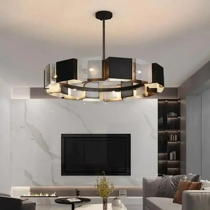 Modern geometric black metal loft led chandelier with frosted glass panels in a circular design for dining room decorbites black metal