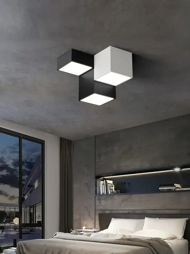 Modern geometric black and white cube bedroom ceiling lamp with three minimalist cube panels in staggered design