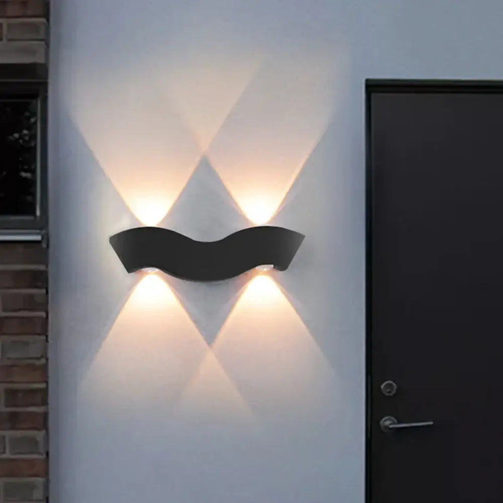 Modern geometric black wavy led wall light with three warm-toned lights for living room decorbites led wall sconce
