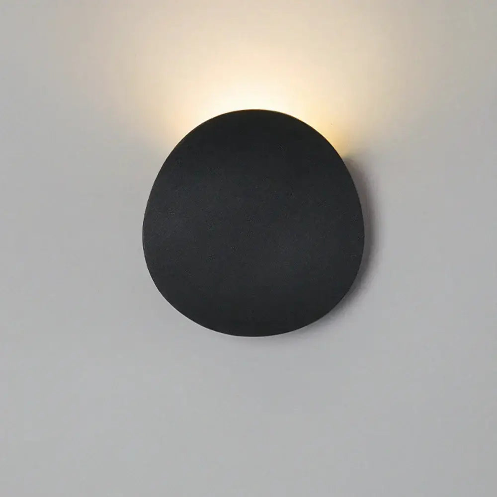 Modern geometric black matte led wall light with soft warm glow for living room decorbites led wall sconce