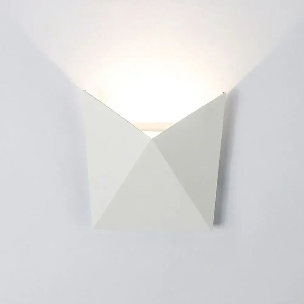 Minimalist white geometric led wall light with angular triangular facets for modern living room decorbites led wall decor