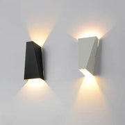 Modern geometric black and white led wall light with matte finish and warm ambient lighting for living room decorbites led wall