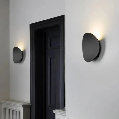 Modern matte black oval led wall light with warm soft lighting for living room decorbites led wall sconce