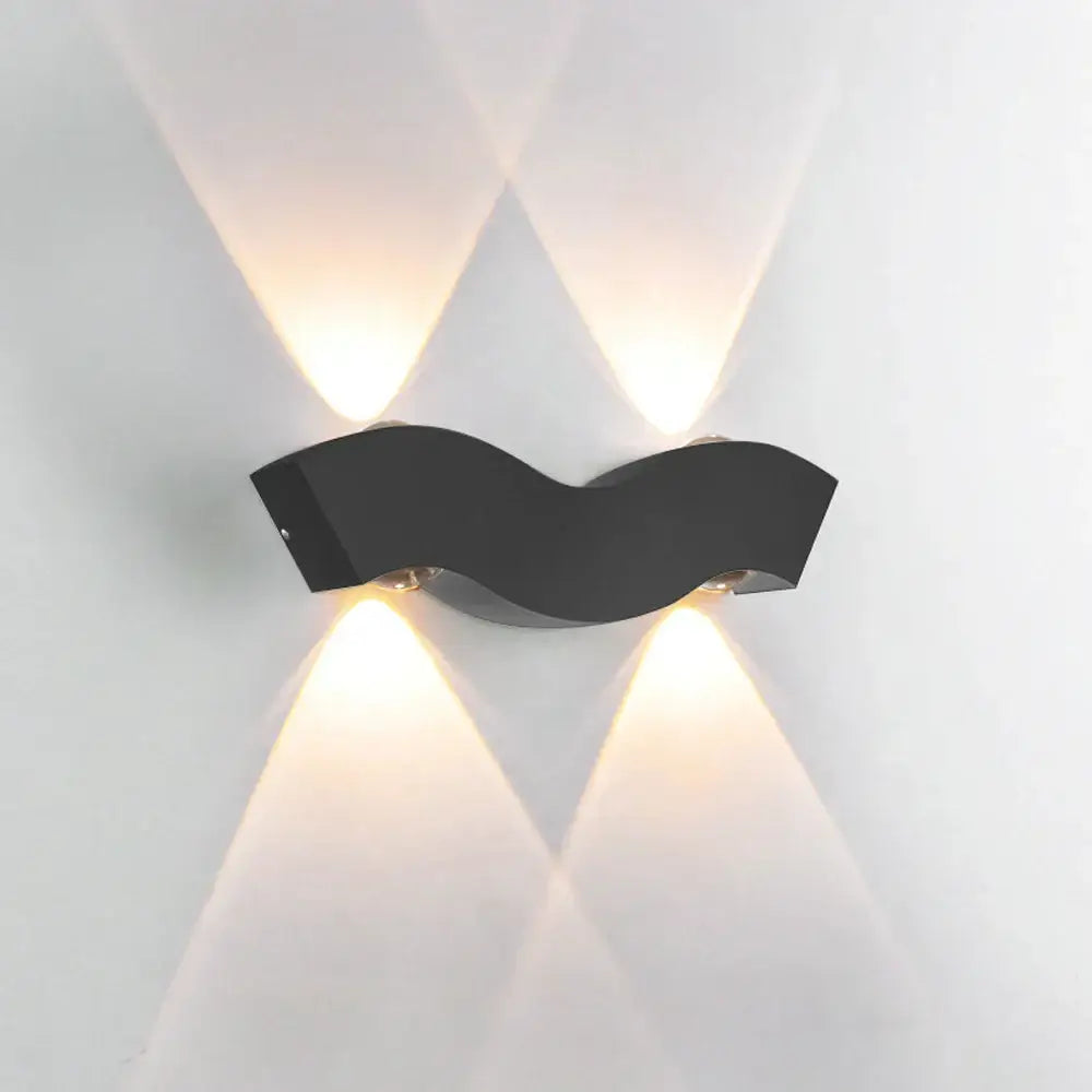 Modern geometric black wavy led wall light with four warm lights casting geometric shadows for living room decorbites led wall