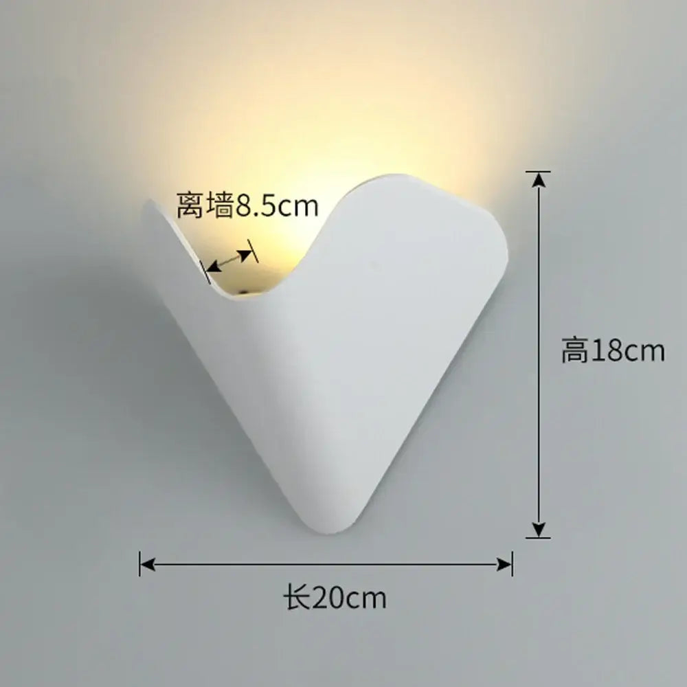 White minimalist v-shaped led wall light with smooth matte finish for modern geometric living room decorbites led wall