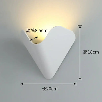 White minimalist v-shaped led wall light with smooth matte finish for modern geometric living room decorbites led wall