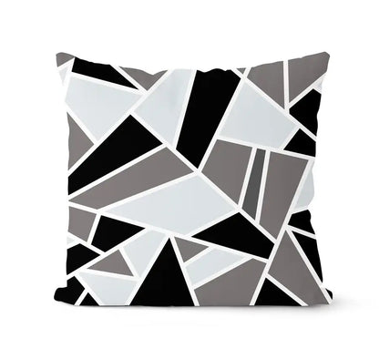 A modern geometric black and white throw pillow featuring a mosaic pattern from decorbites geometric pillowcase set