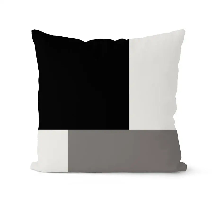 A modern square throw pillow with a bold geometric black white design from decorbites geometric pillowcase set
