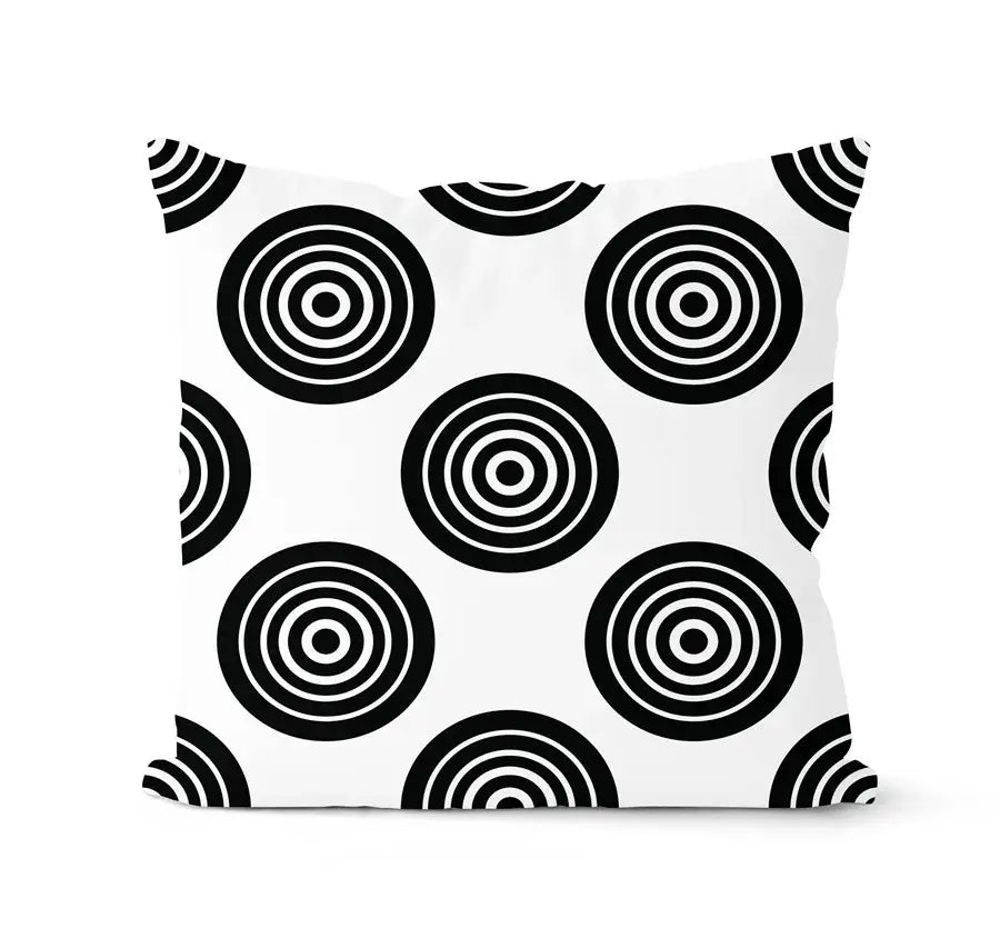 White throw pillow with bold black concentric circle pattern from decorbites geometric black white pillowcase set