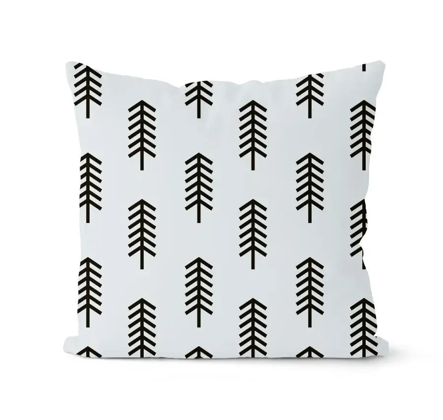 White throw pillow with a repeating black stylized pine tree pattern in the decorbites geometric black and white pillowcase set