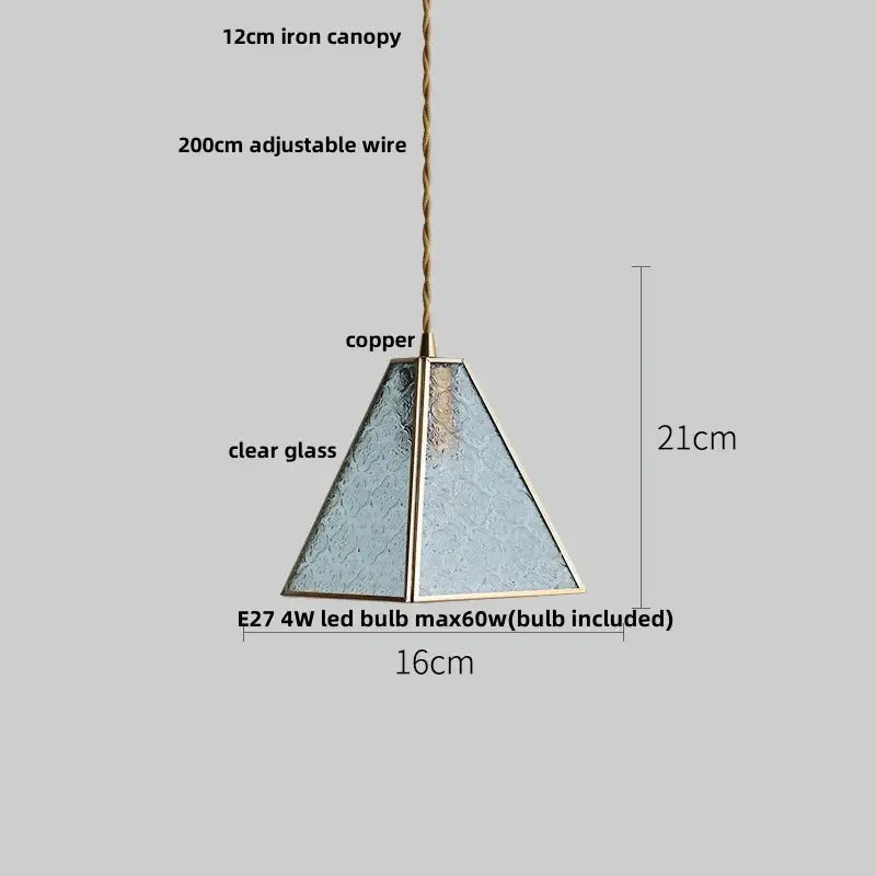 Modern geometric pendant light with blue glass and brass frame suspended by adjustable wire for dining room decorbites blue glass