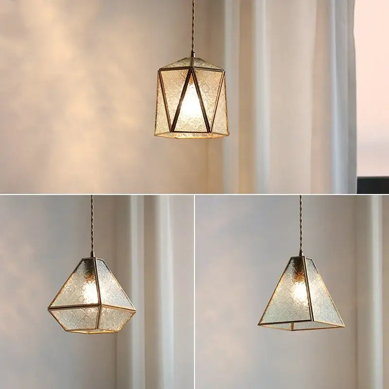 Modern geometric blue glass pendant light with textured translucent panels and dark metal frame for dining room decorbites blue glass