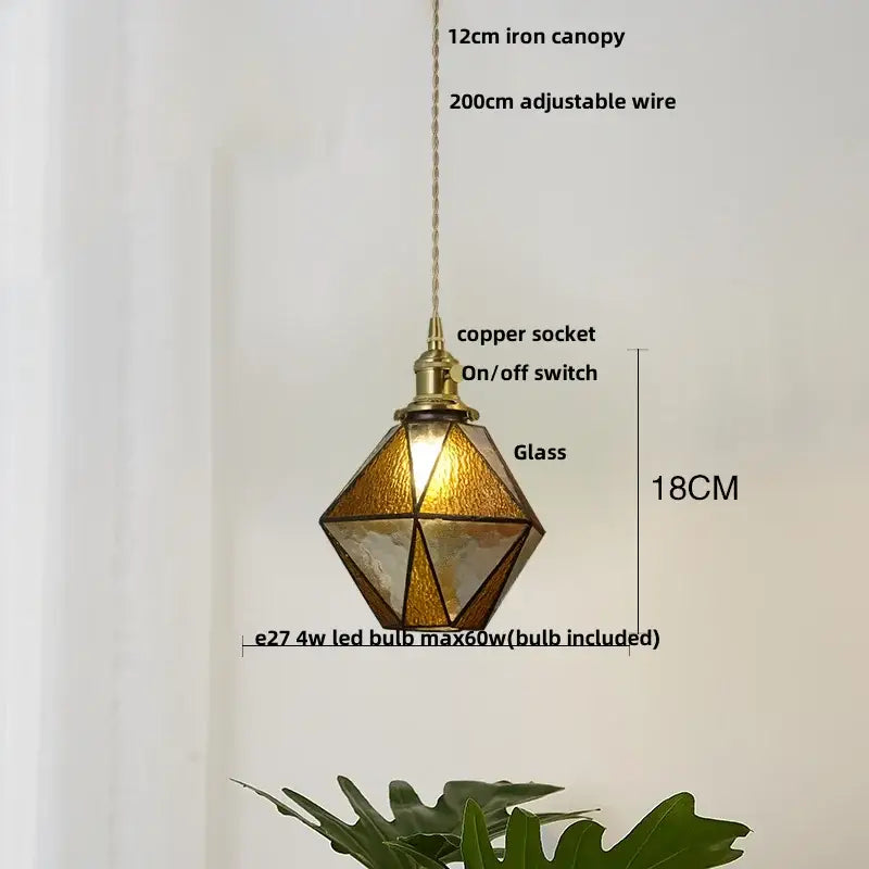 Modern geometric blue glass pendant light with brass-finished copper socket and iron canopy for dining room decorbites blue glass
