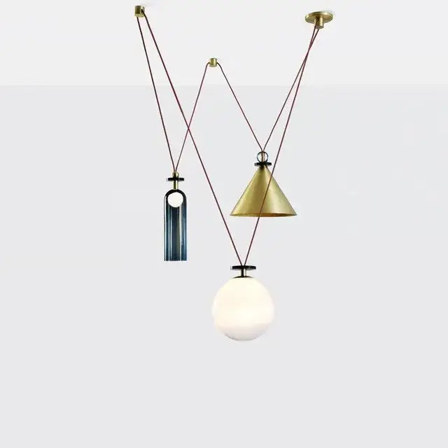 Modern geometric brass and black glass pendant light with three adjustable shape led shades for dining room use