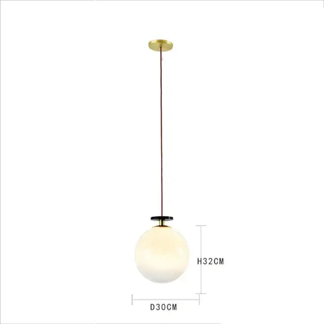 Modern geometric brass and black glass pendant light with frosted glass globe for dining room use