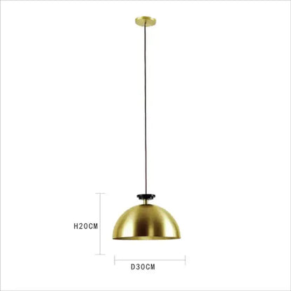 A sleek brushed gold dome pendant light with black cord for dining room featuring modern geometric brass design