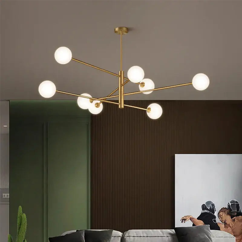 Modern geometric decorbites brass chandelier with gold-toned branching design and frosted glass bulbs for living room decor