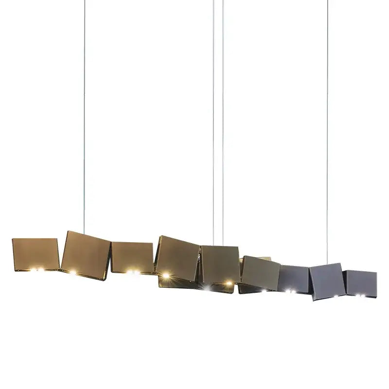 Modern geometric bronze and dark gray pendant light with bronze finish box shape and warm led illumination for dining room decorbites