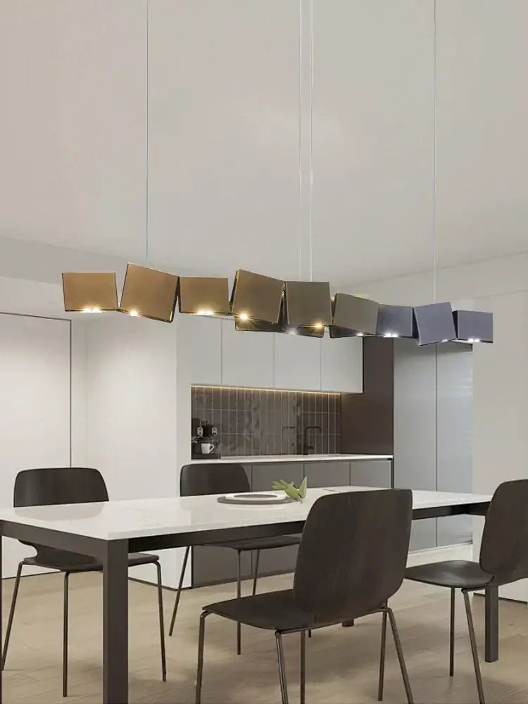 Modern geometric bronze and dark gray box shape pendant light with angular metallic shades for dining room decorbites