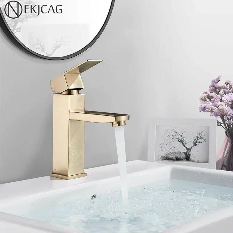Modern geometric brushed gold basin faucet with sleek rectangular spout and handle by decorbites for bathroom sinks