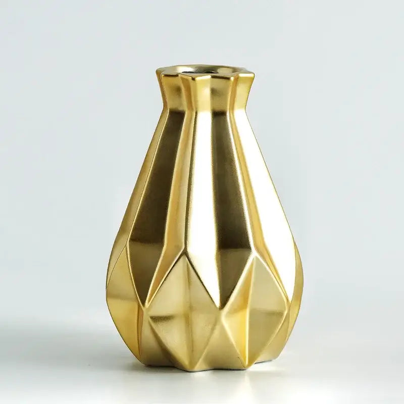 Gold-colored decorbites ceramic diamond vase with faceted geometric design for modern living room decor