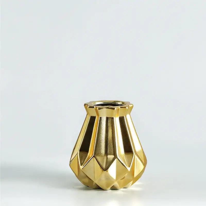 Golden faceted decorbites ceramic diamond vase with angular geometric design for modern living room decor