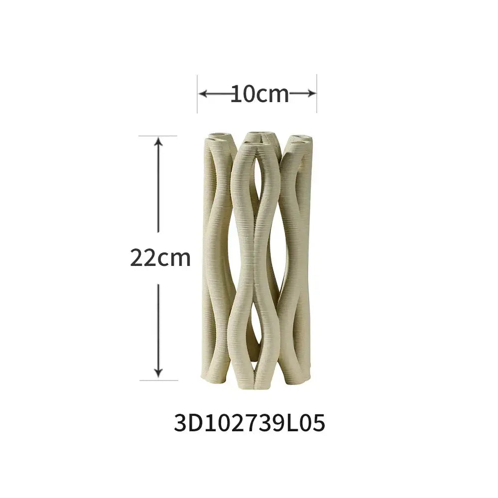 Beige ceramic spiral vase with a modern intertwined ribbed design for living room decorbites geometric ceramic decor