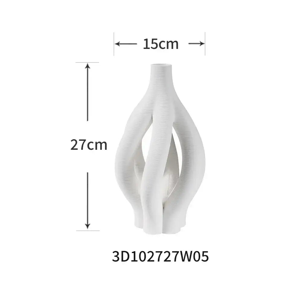 A sleek white ceramic spiral vase with an asymmetric design and textured surface for modern geometric ceramic decorbites