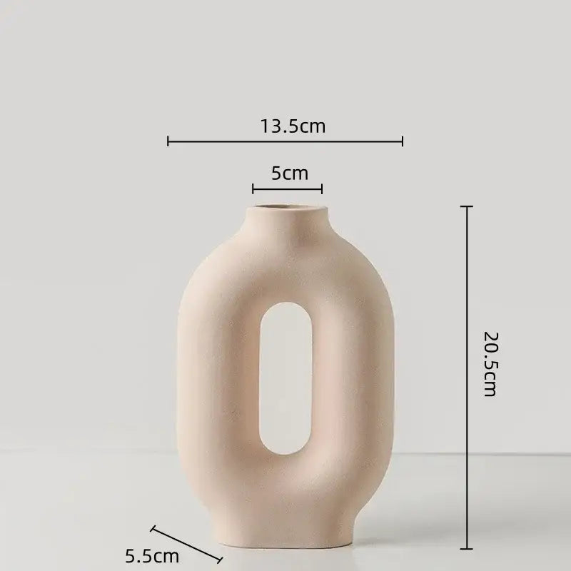 Minimalist beige decorbites geometric ceramic vase with smooth matte finish and oval cutout for modern living room decor