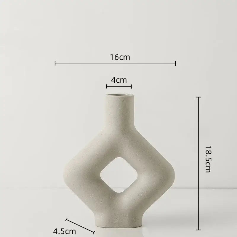 Minimalist off-white decorbites geometric ceramic vase with diamond-shaped cutout for modern living room decor
