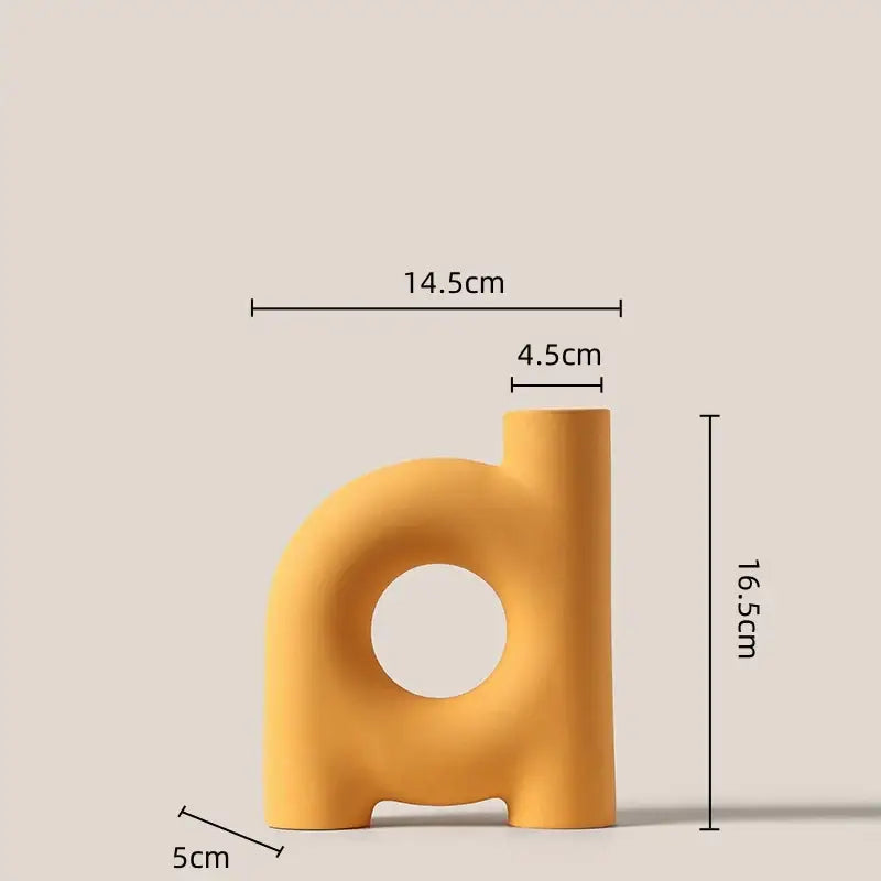 Matte yellow geometric ceramic vase shaped like letter d with circular cutout for modern decorbites geometric decor