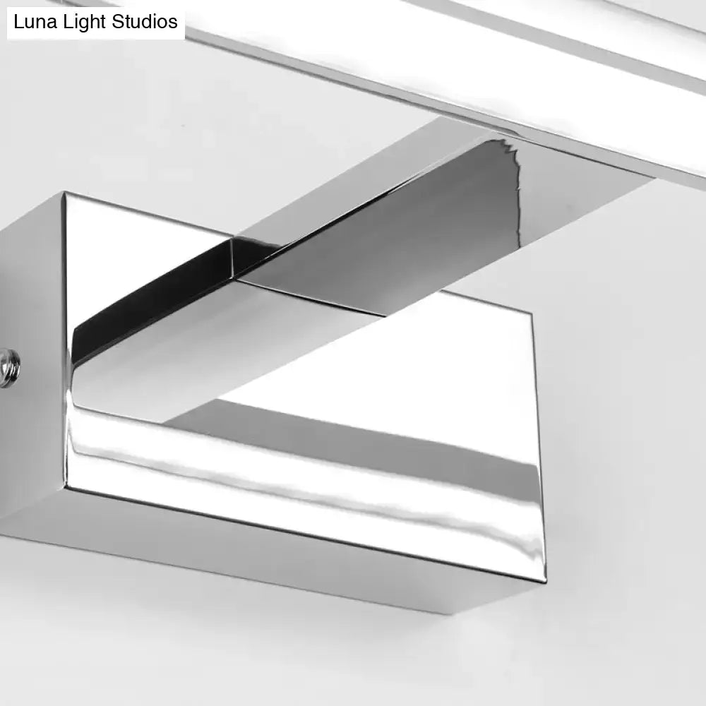 Modern geometric chrome vanity light fixture with sleek angular design wall-mounted for bathroom use